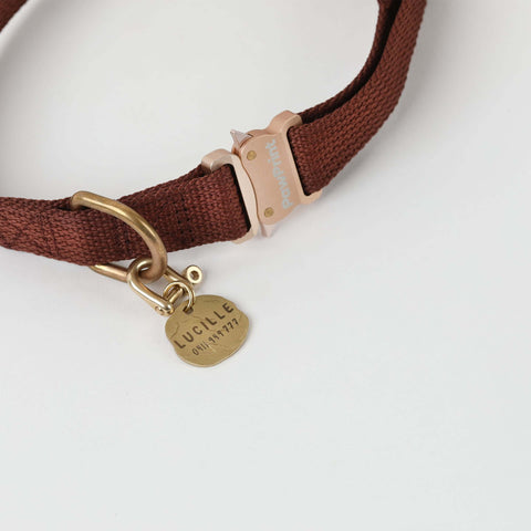 Brown Waterproof dog collar made from recycled ocean plastic with a brass dog tag 