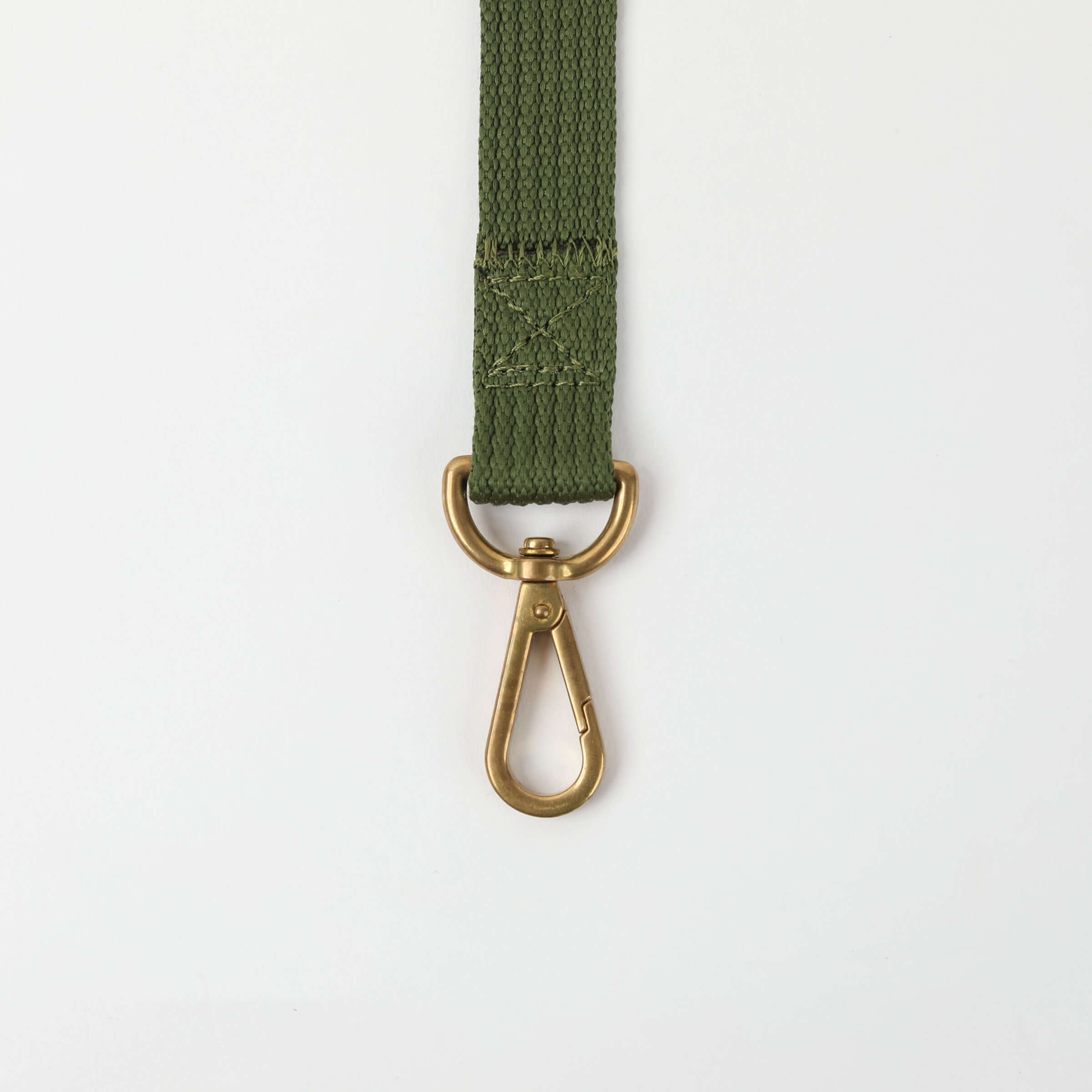The clip end of a Green Waterproof dog leash made from 100% recycled ocean plastic